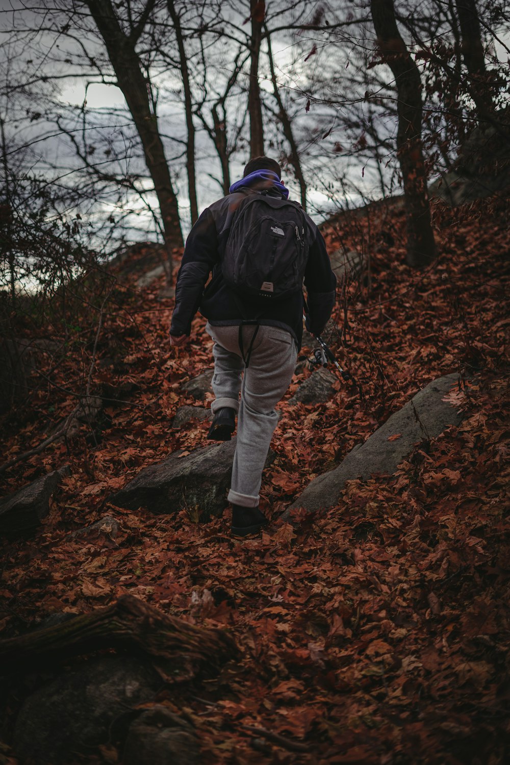 unknown person walking on trail