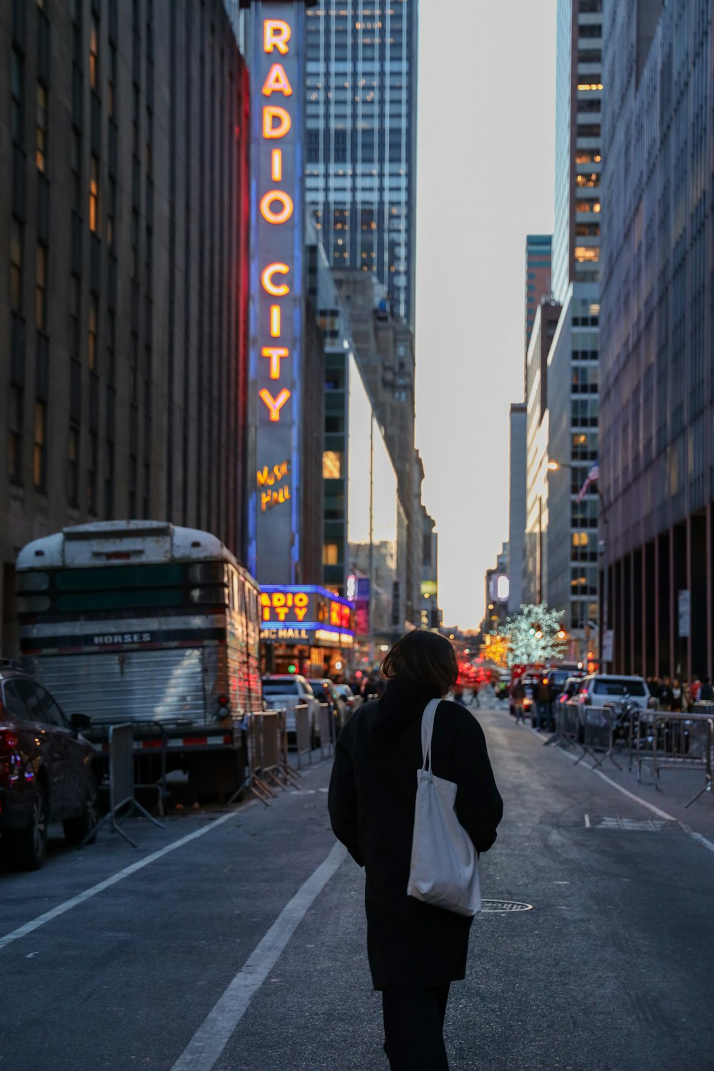 woman standing in middle of road