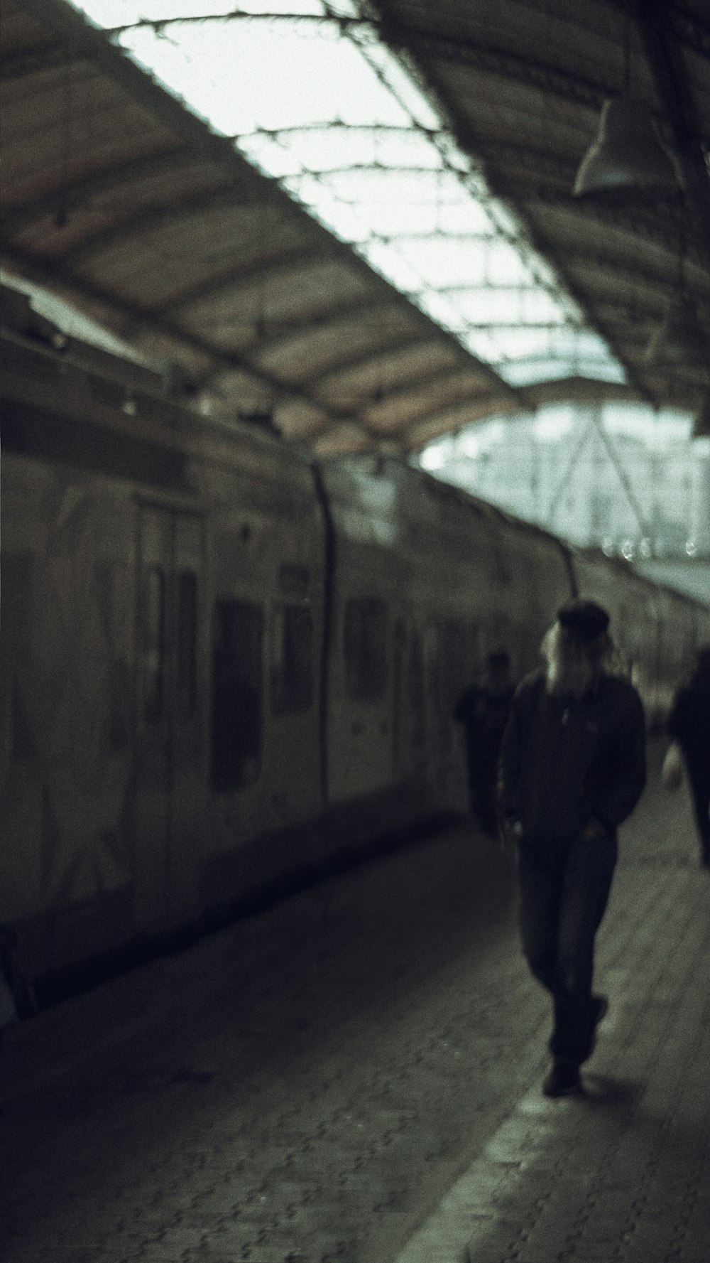 people walking on train station during daytime