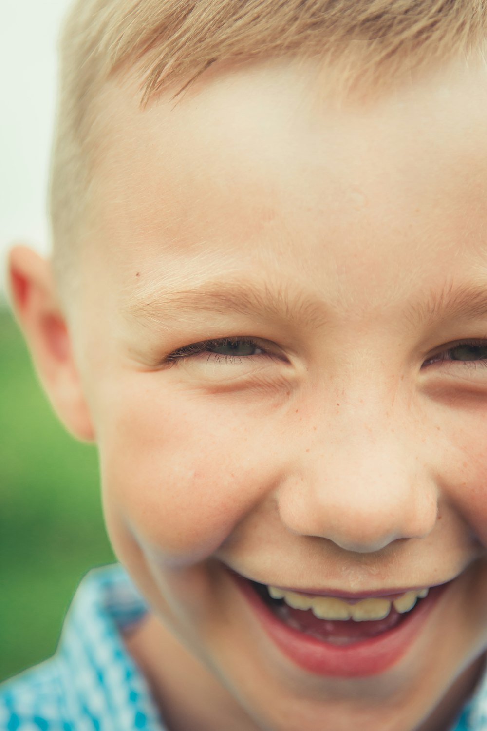 boy in blue collared shirt