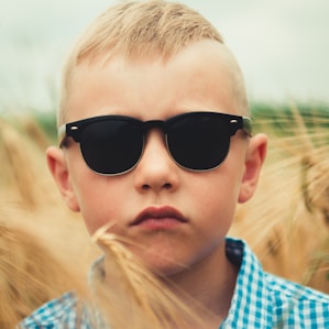 boy wearing black sunglasses