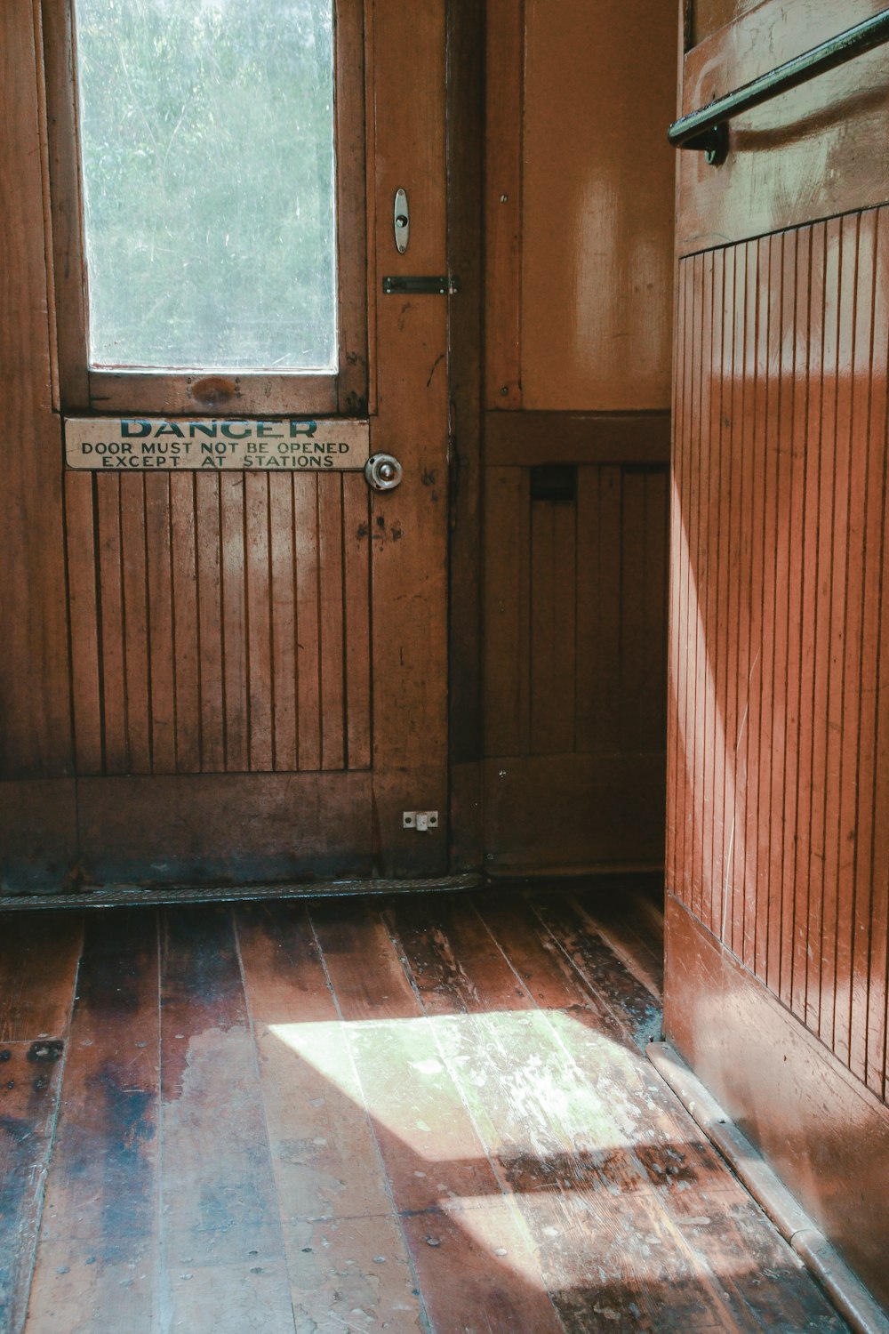 closed brown wooden door