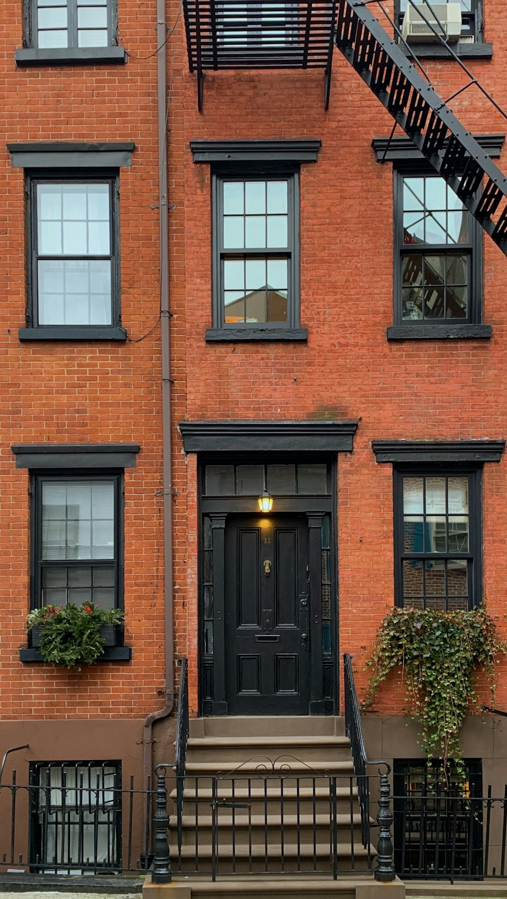 orange concrete building showing closed door