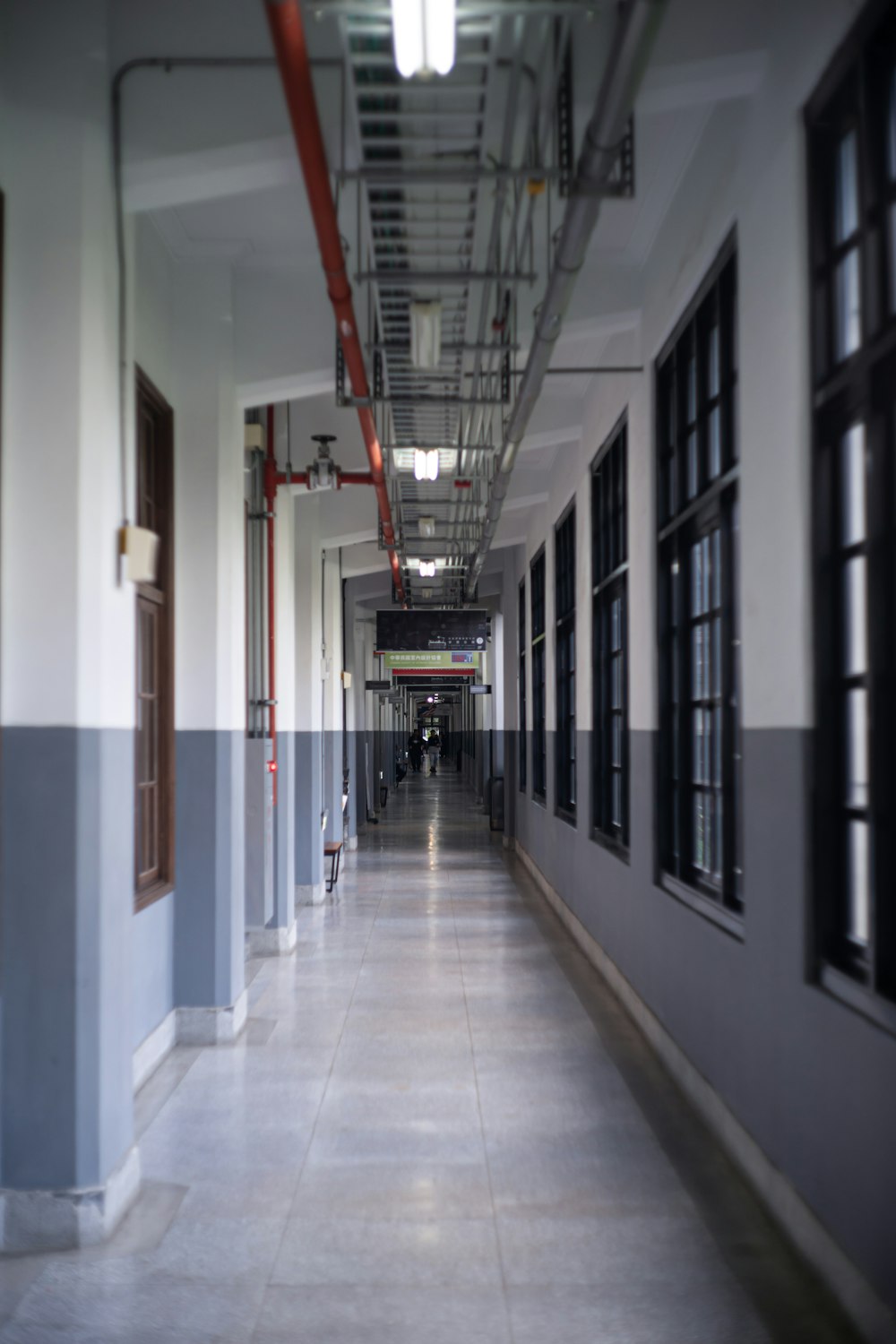 architectural photography of hallway aisle