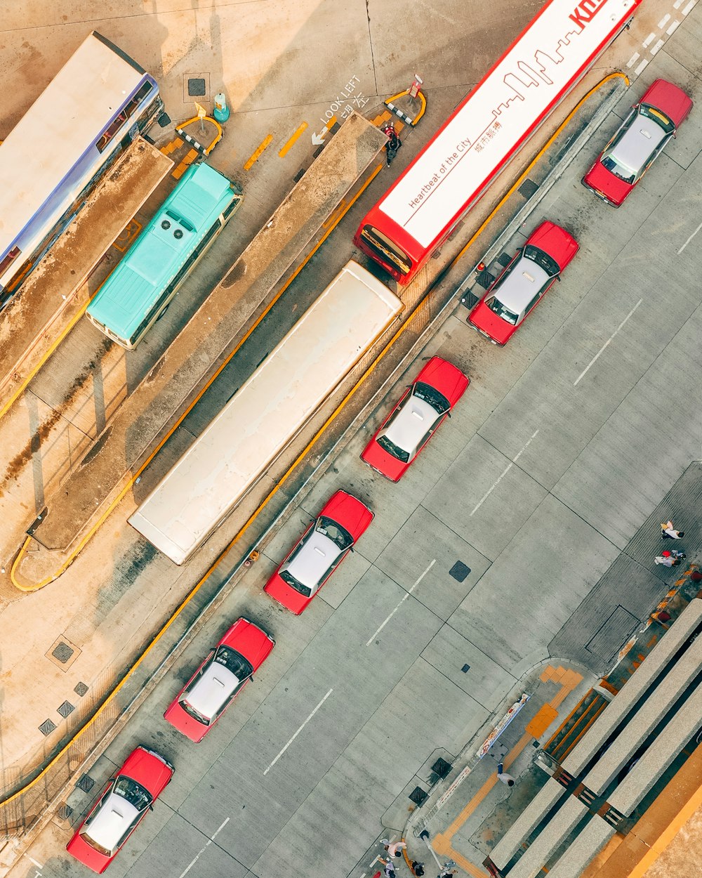 red cars on road