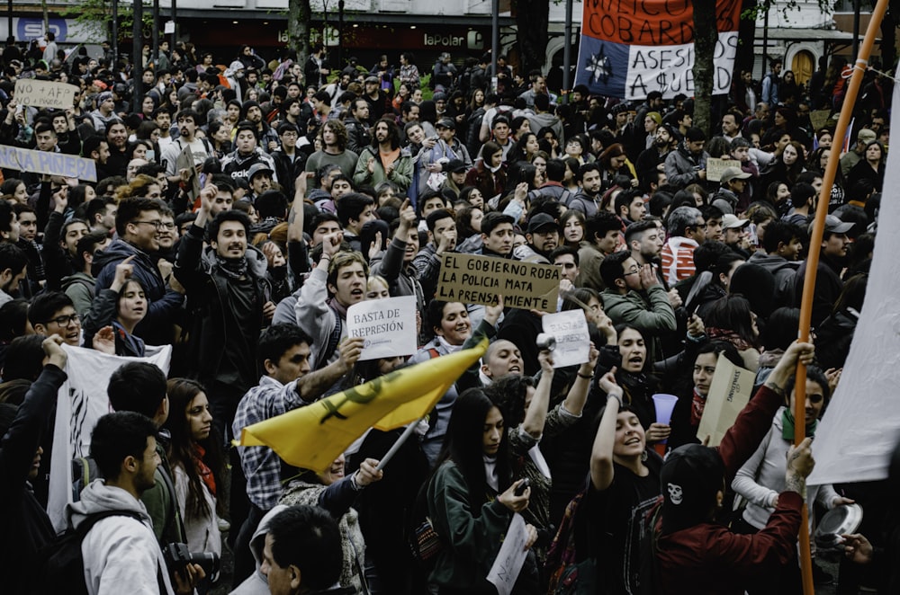 group of people protesting outdoors