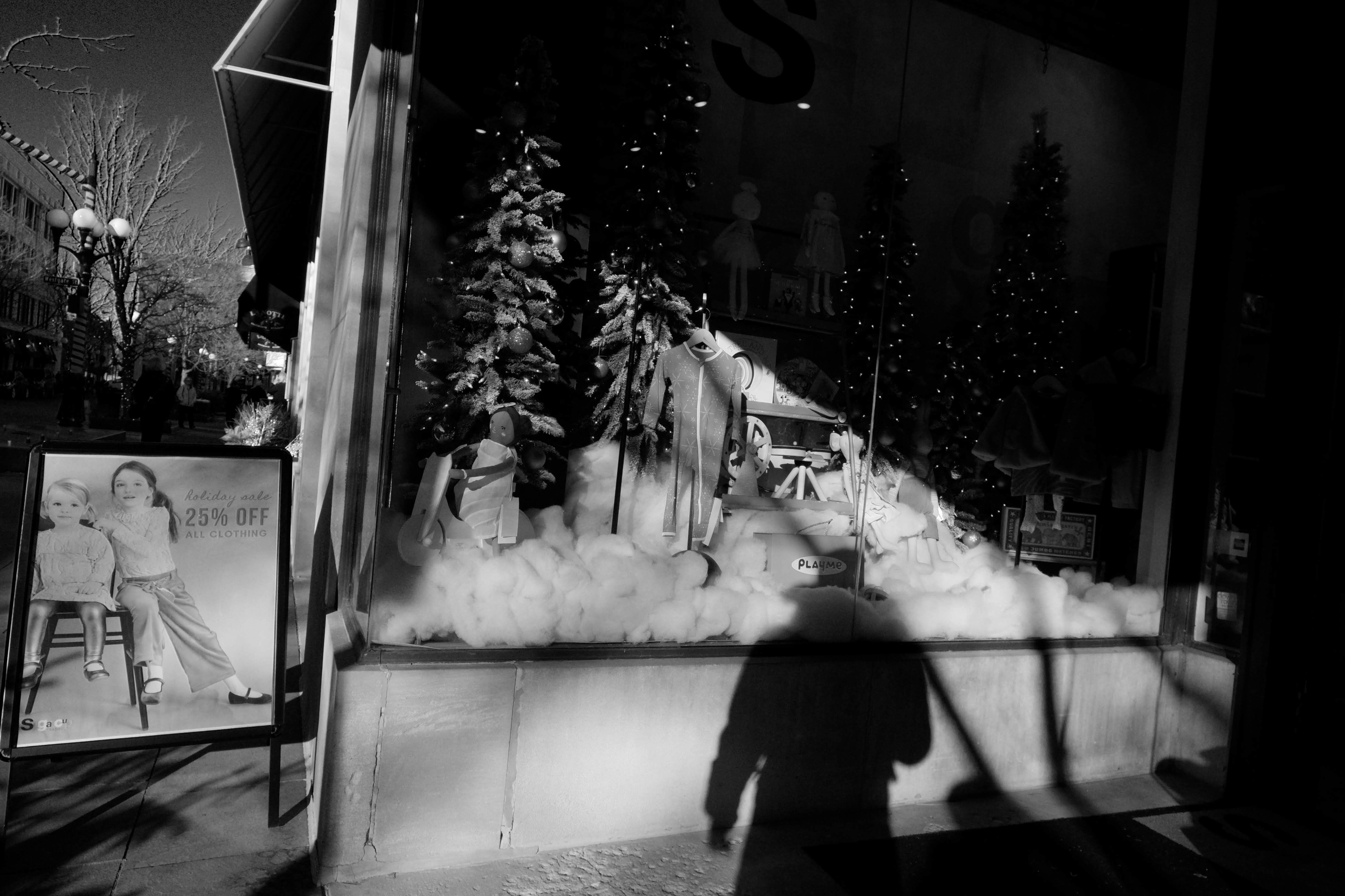 Grayscale photography of Christmas tree inside store photo Free Grey