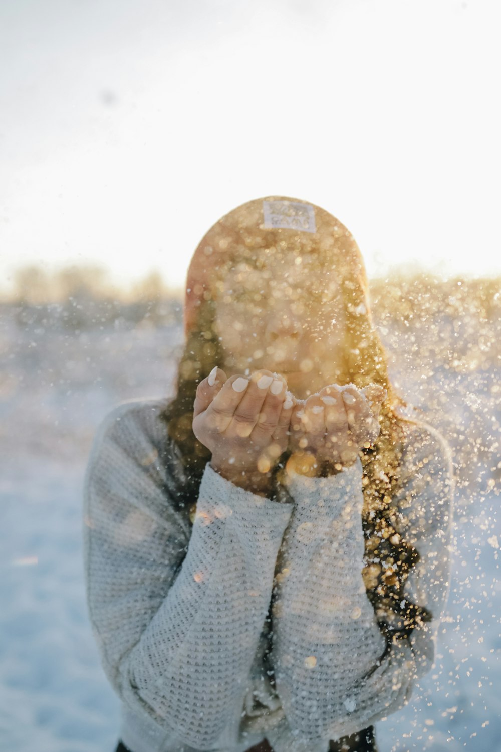 woman in white sweater