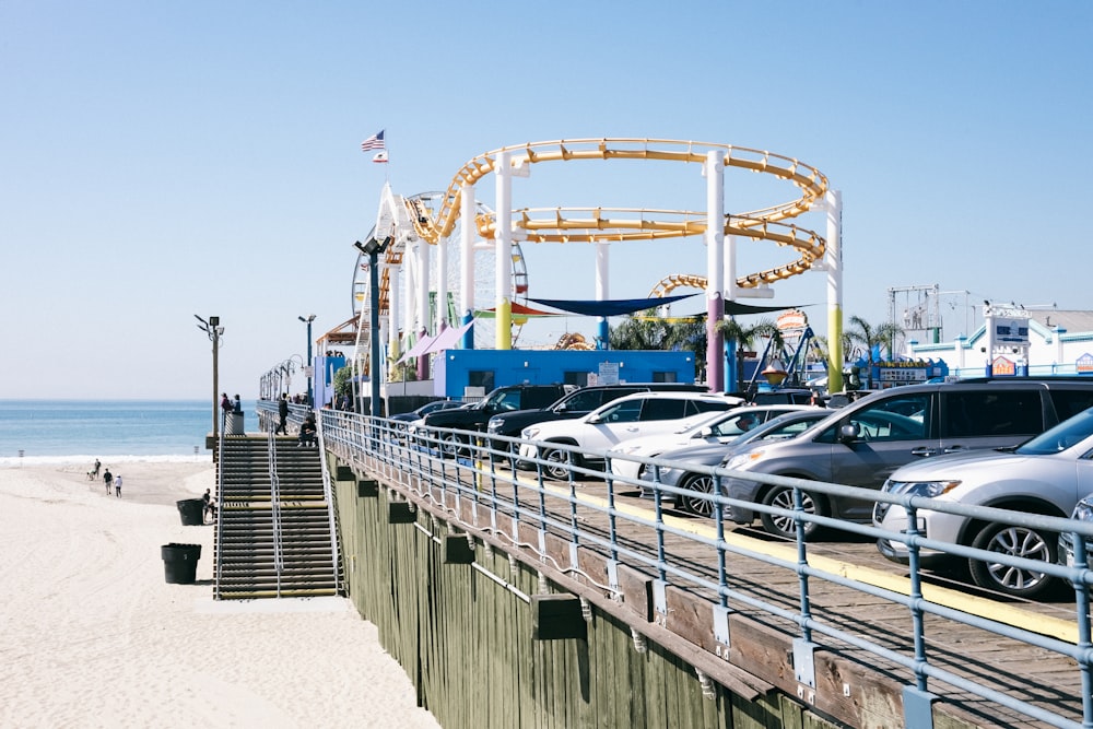 cars parked near ocean during daytime