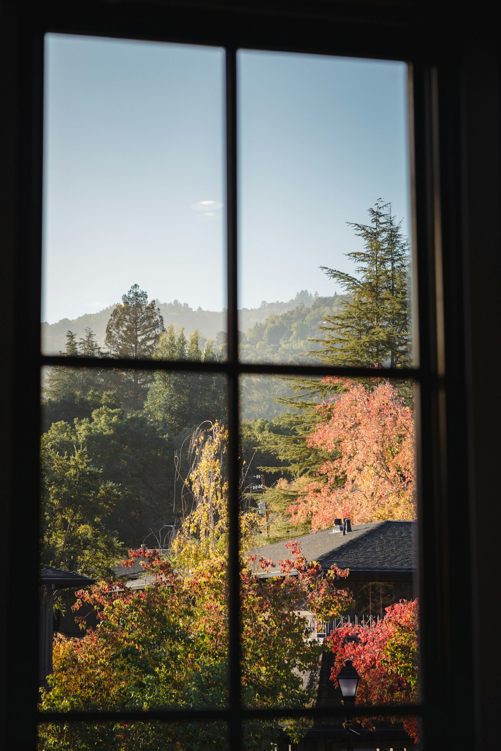 white framed clear glass window