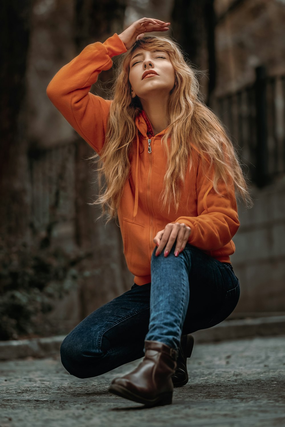 woman squatsitting on road