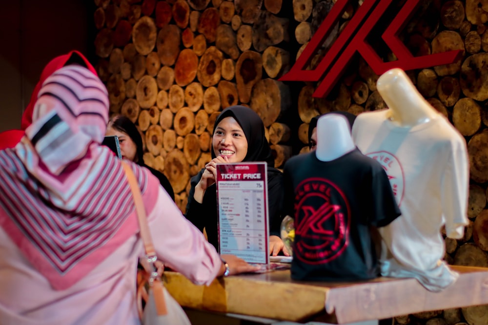 shallow focus photo of woman in black hijab headdress