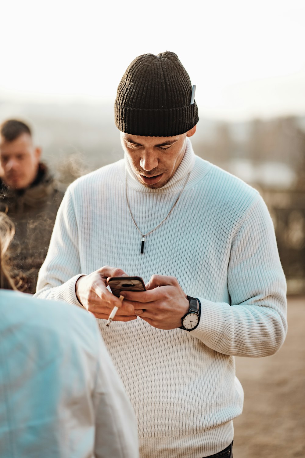 shallow focus photo of white turtleneck long-sleeved shirt