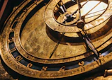a close up of a clock with roman numerals
