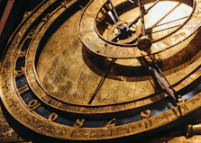 a close up of a clock with roman numerals