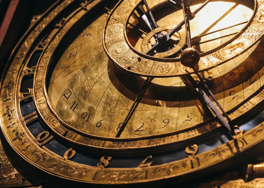 a close up of a clock with roman numerals|600