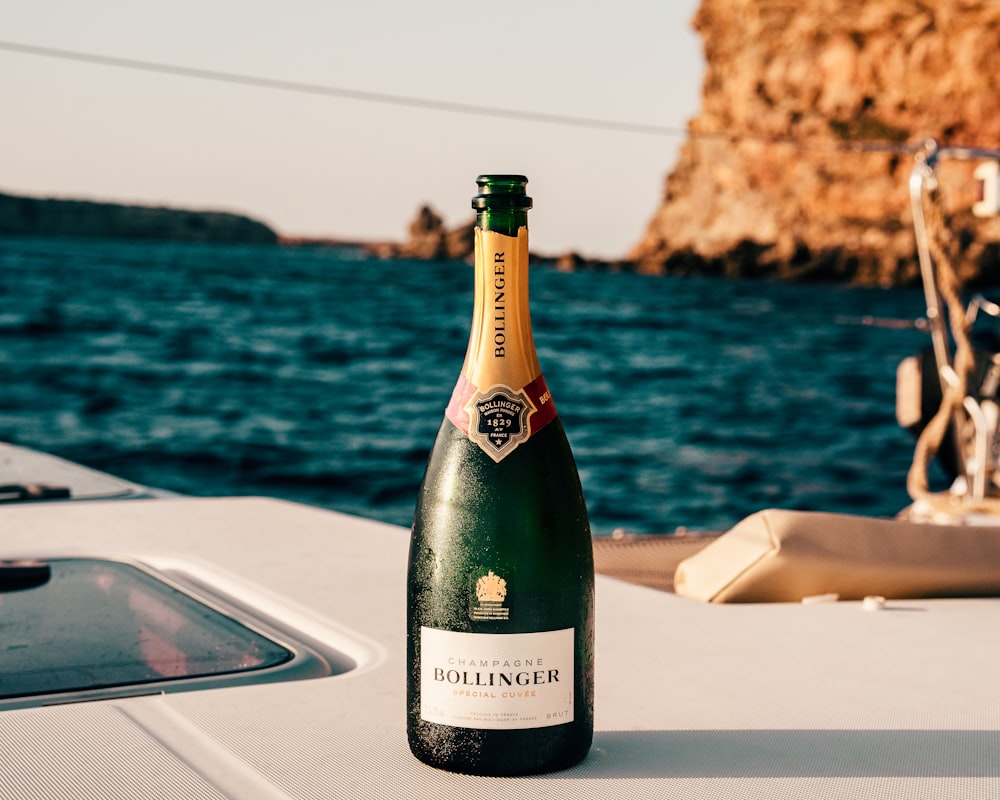 Bollinger wine bottle on white surface