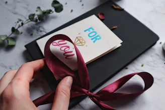for you card with red ribbon