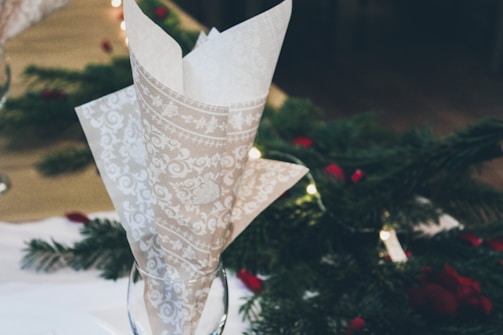 Close-up of high-quality party napkins with festive prints, highlighting texture and detail.