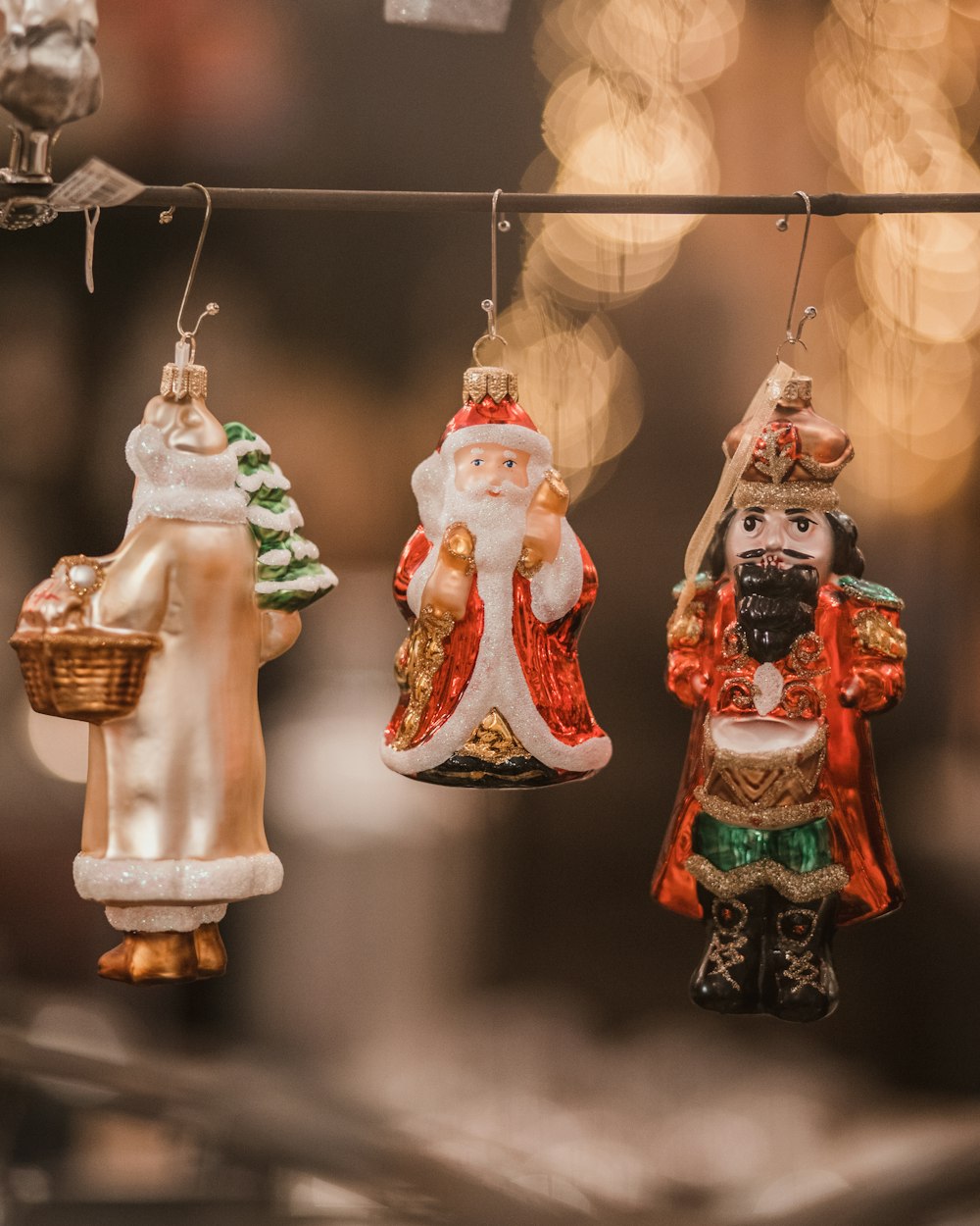 three Christmas tree ornaments