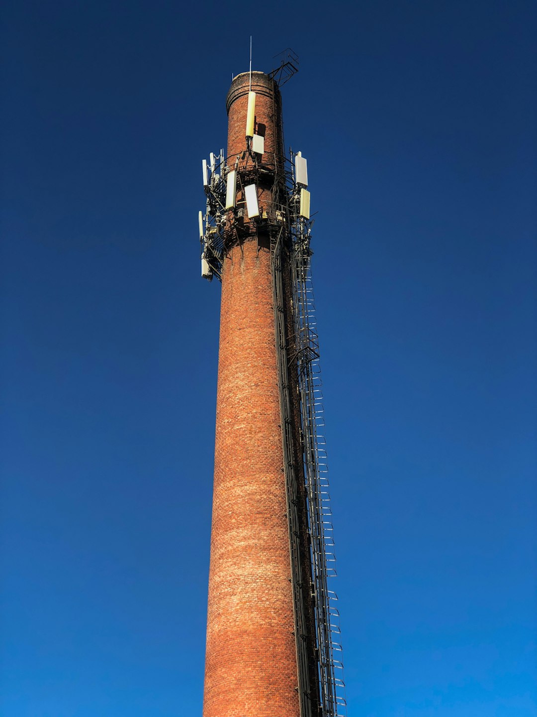 selective focus photography of brown tower under blue sky