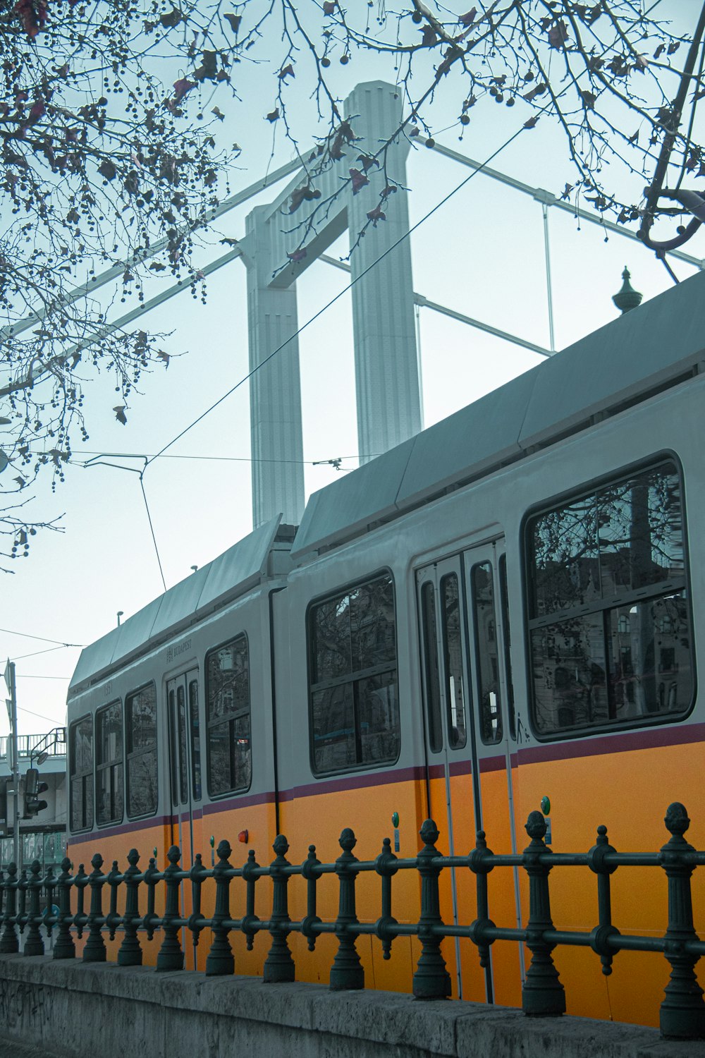 shallow focus photo of white and orange train