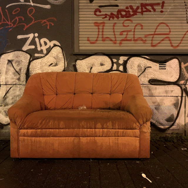 Shallow focus photo of a brown padded couch