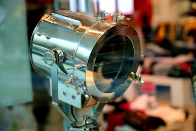 Close-up of a sleek, durable reflector with adjustable mounting bracket