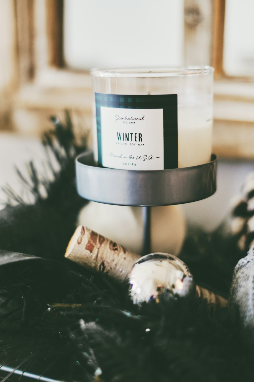 white and black Winter candle holder