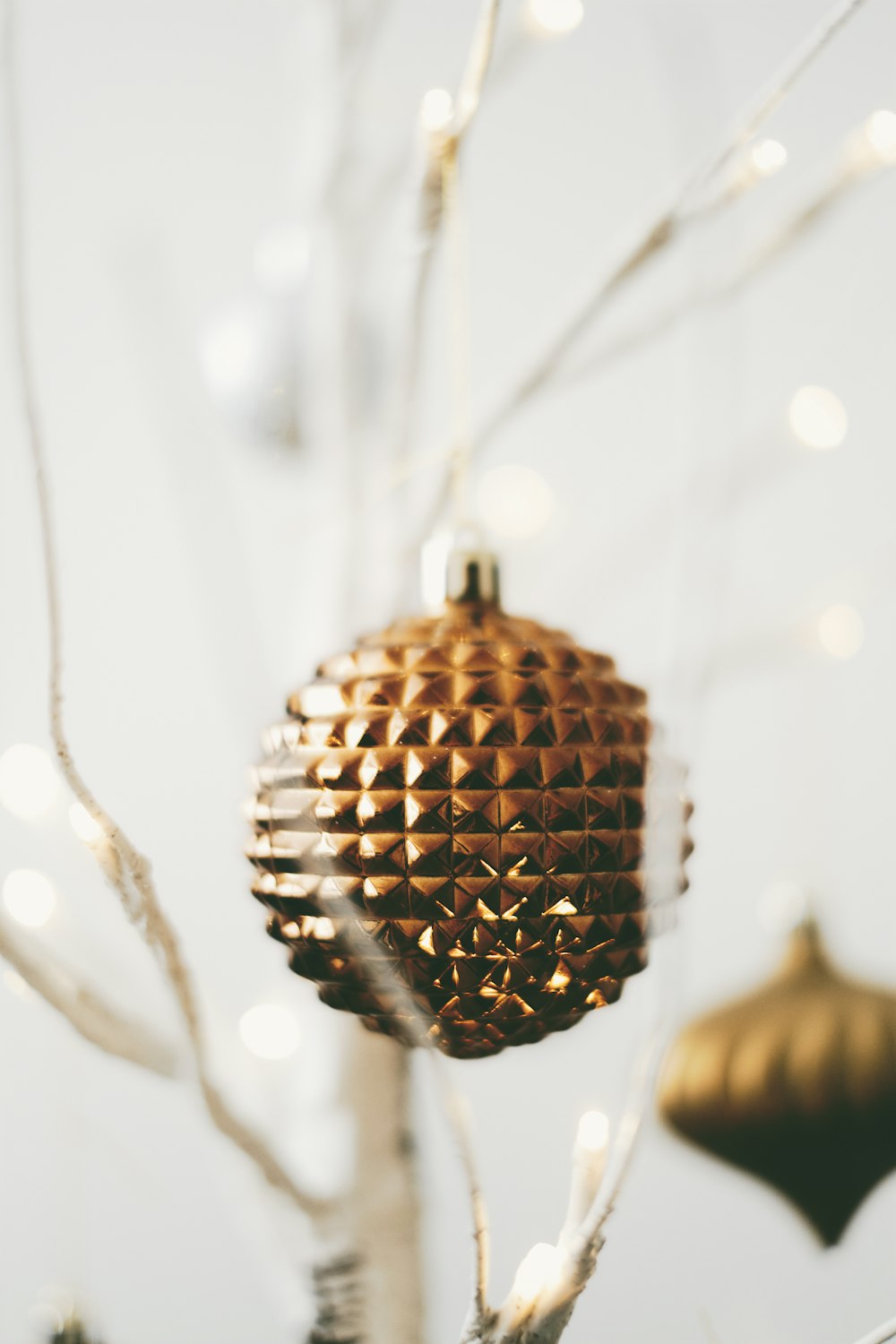 hanging gold-colored bauble