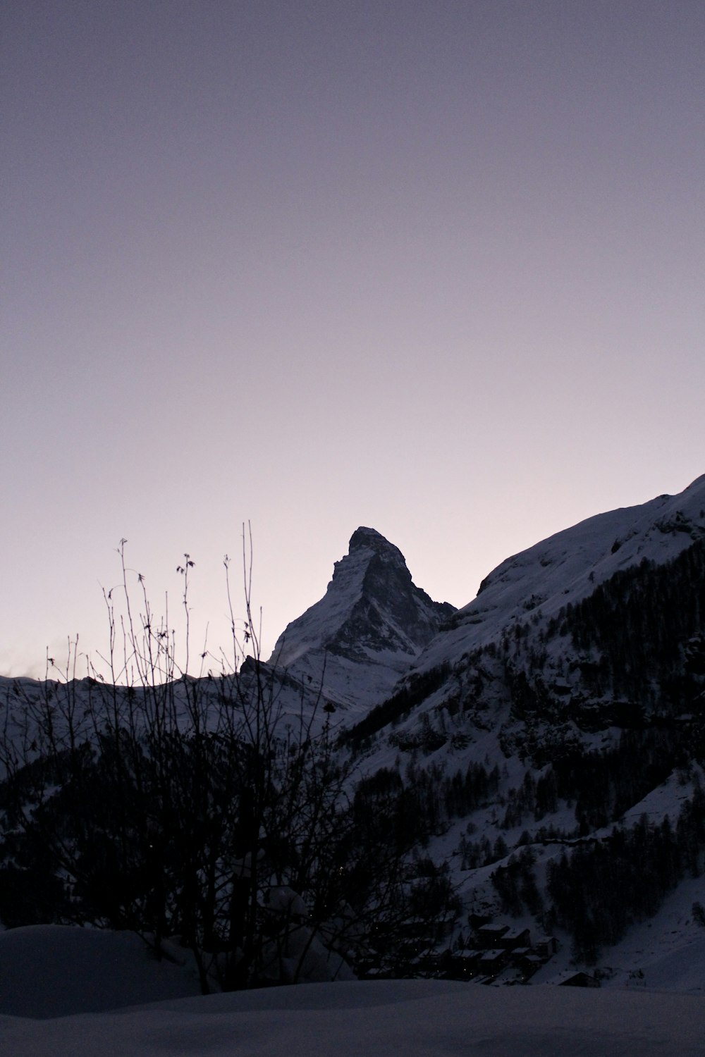 photography of snow-capped mountain range during daytime