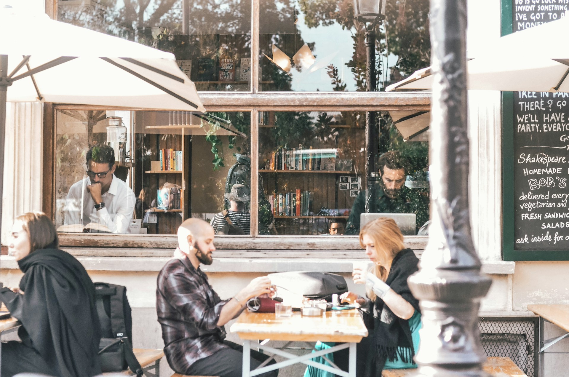 woman wearing yellow long-sleeved dress under white clouds and blue sky during daytime