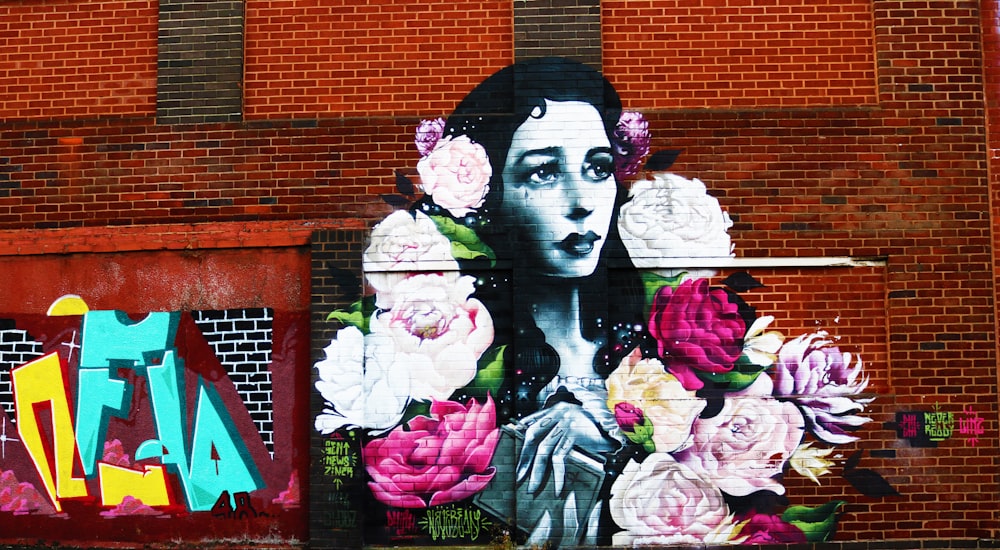 shallow focus photo of woman and flowers wall art
