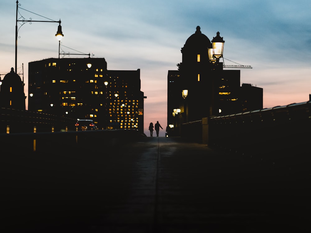 silhouette of person on road