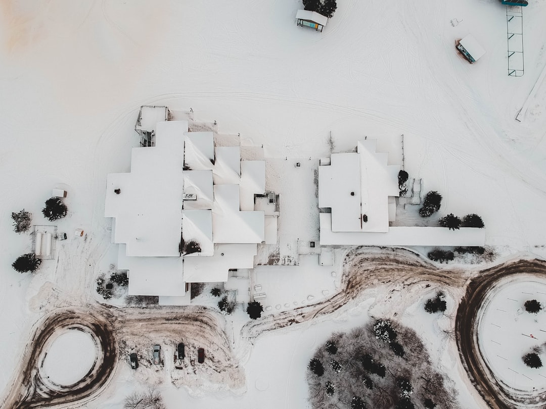 aerial photography of houses covered with snow