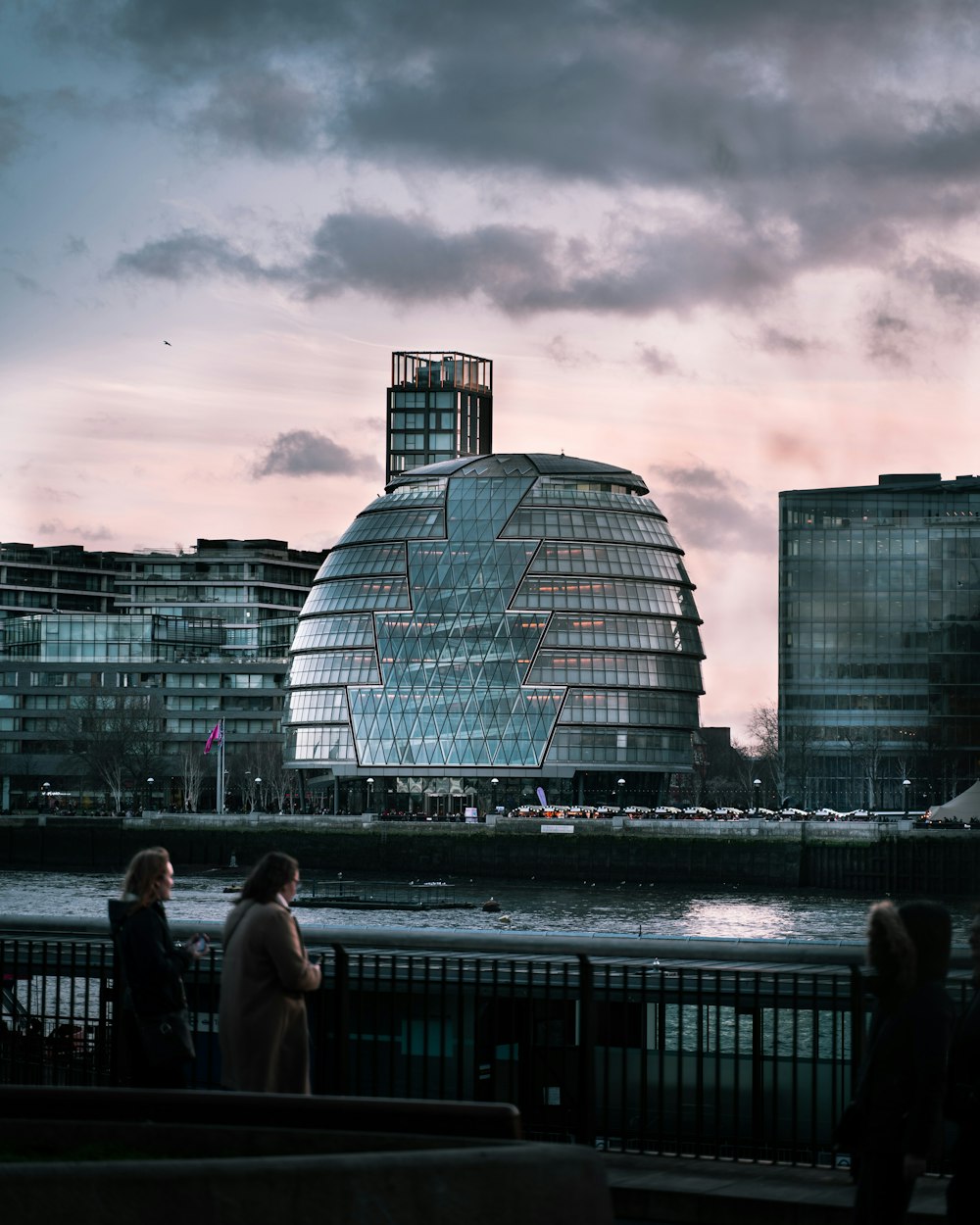 shallow focus photo of gray building under cloudy sky