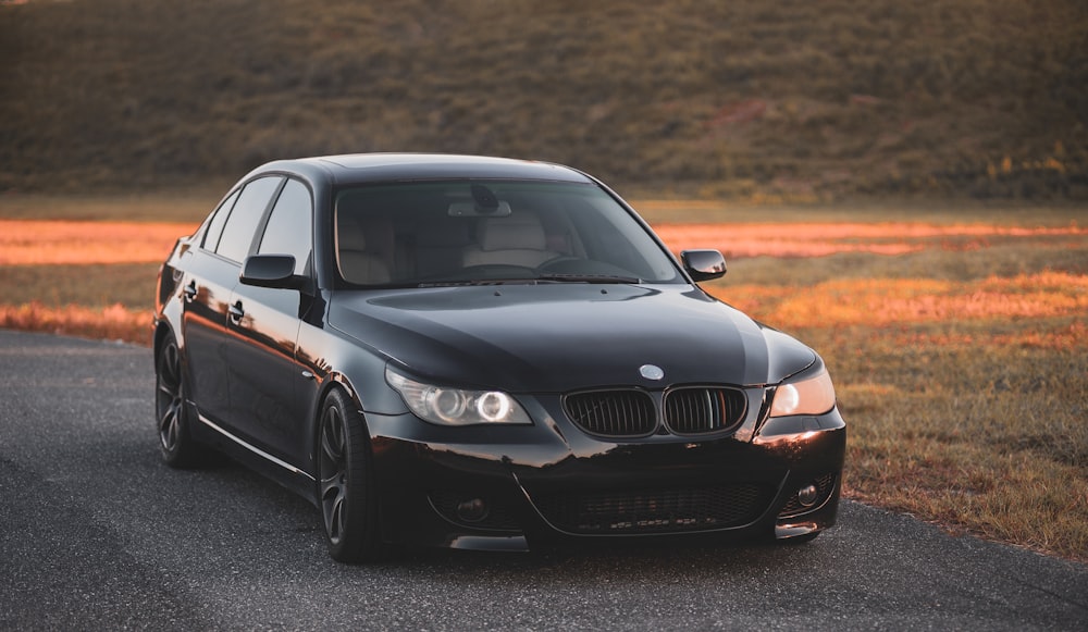 black BMW sedan during daytime