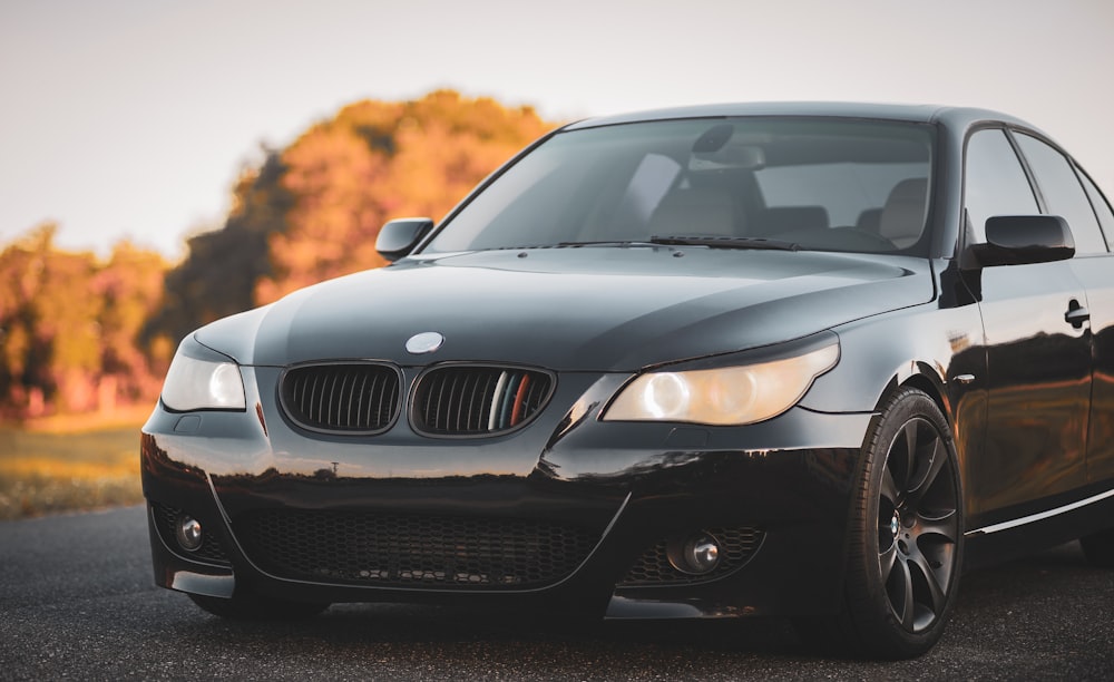shallow focus photo of black BMW sedan