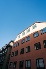 low-angle photography of multi-storey building during daytime