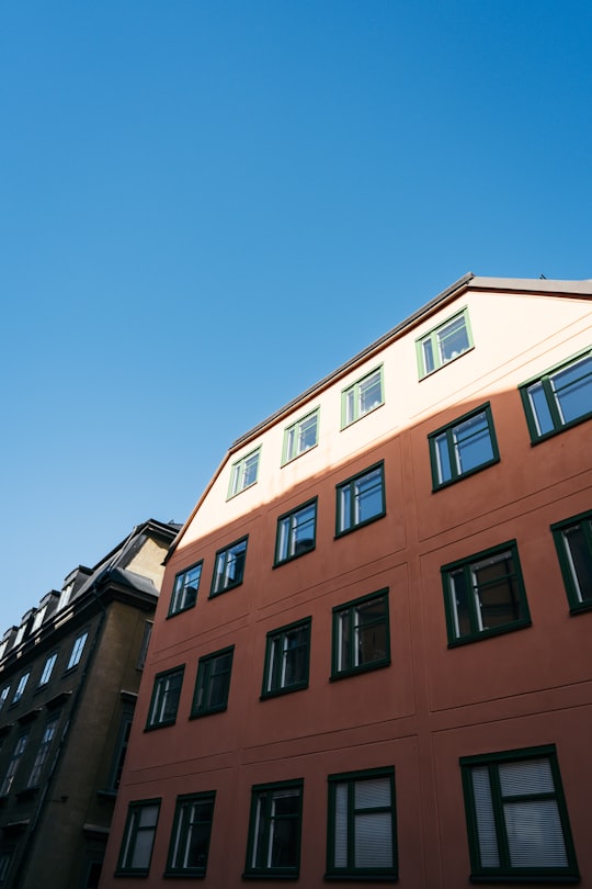 low-angle photography of multi-storey building during daytime in Stockholm Sweden