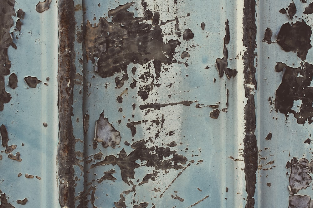 a close up of a rusted metal surface