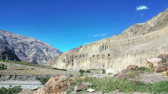 brown hills under blue sky in Ladakh India