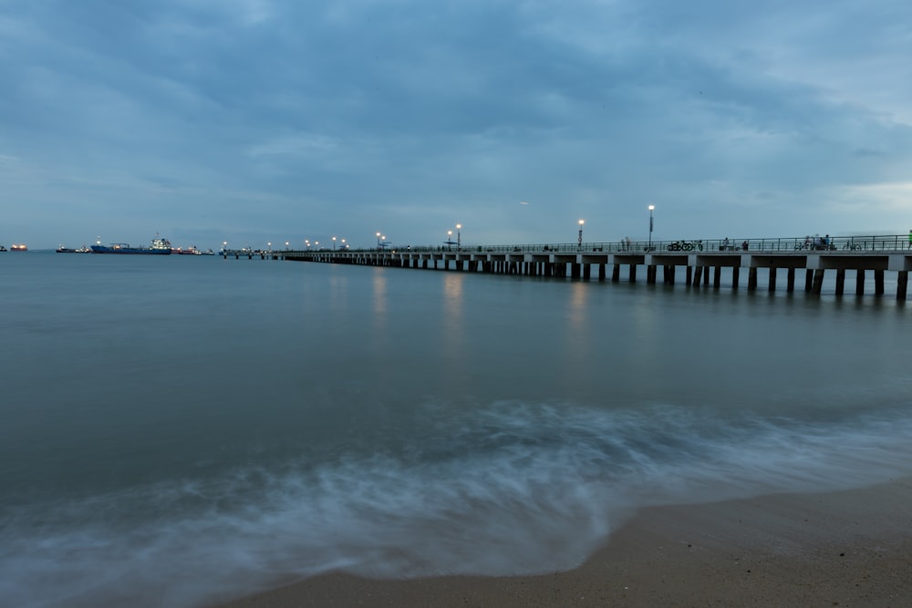 turned-on lamps on dock during daytime