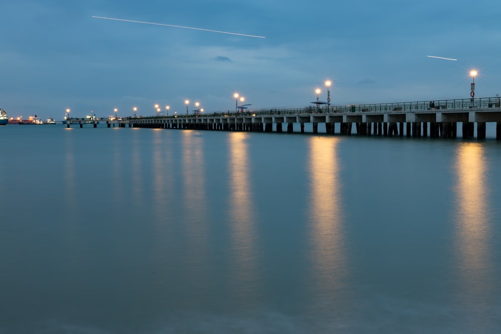 turned-on lamps on bridge during daytime