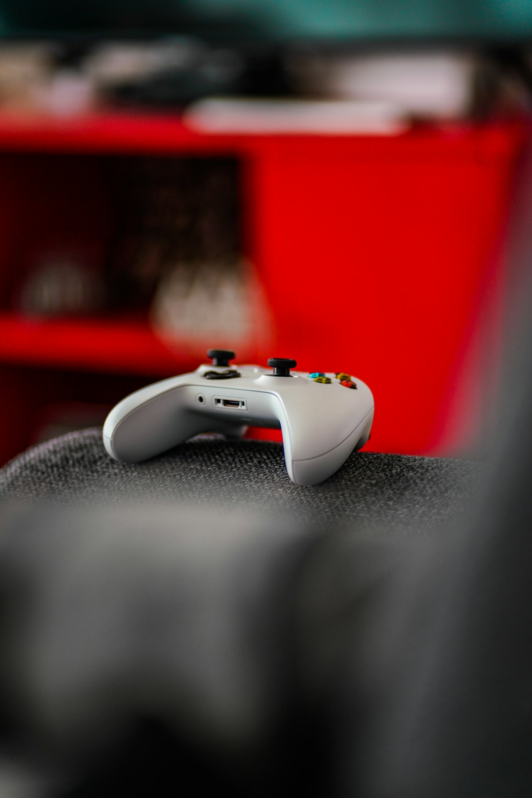 shallow focus photo of white Microsoft Xbox wireless game controller