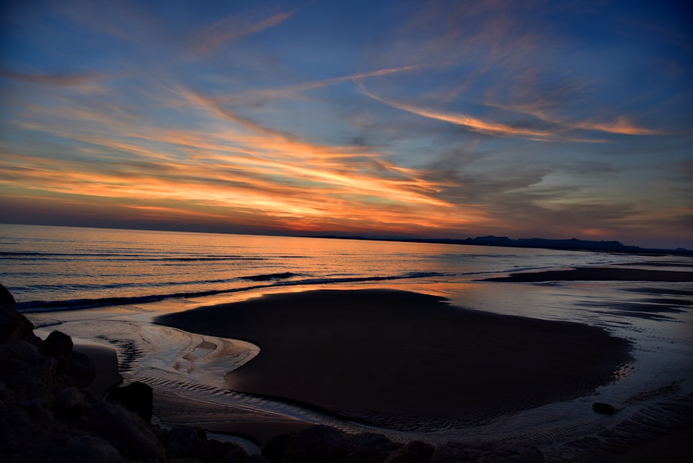 aerial photography of seashore during golden hour