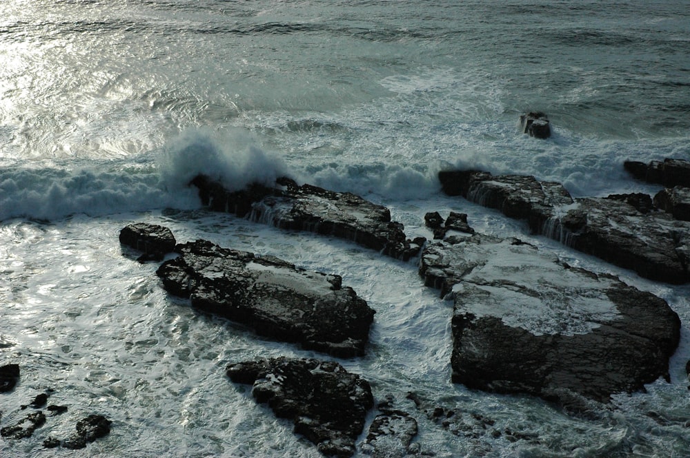 waves crashing on rocks