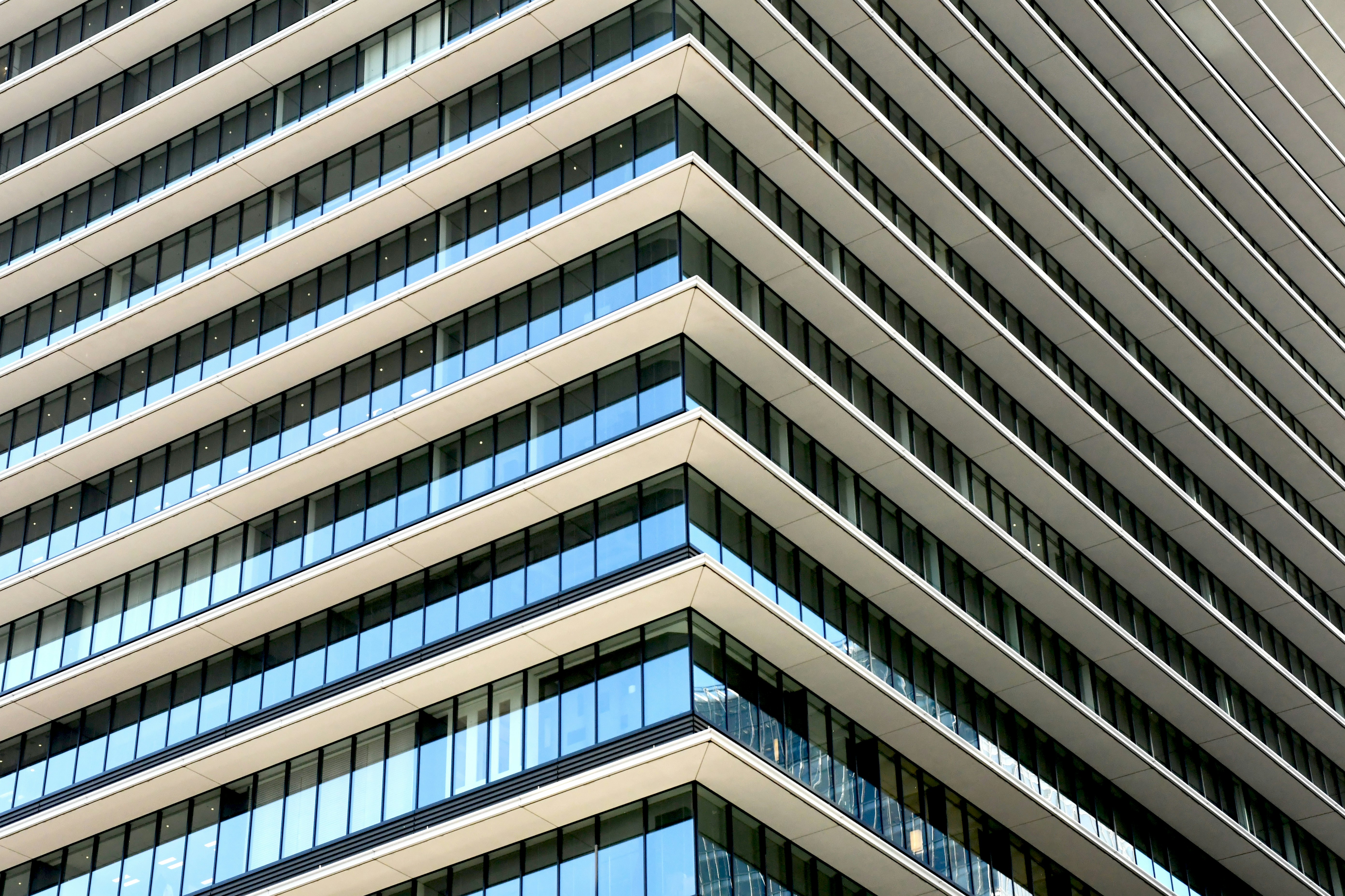 white and glass building during day