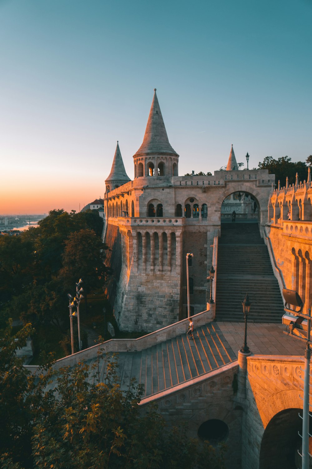 brown concrete castle surrounded by trees