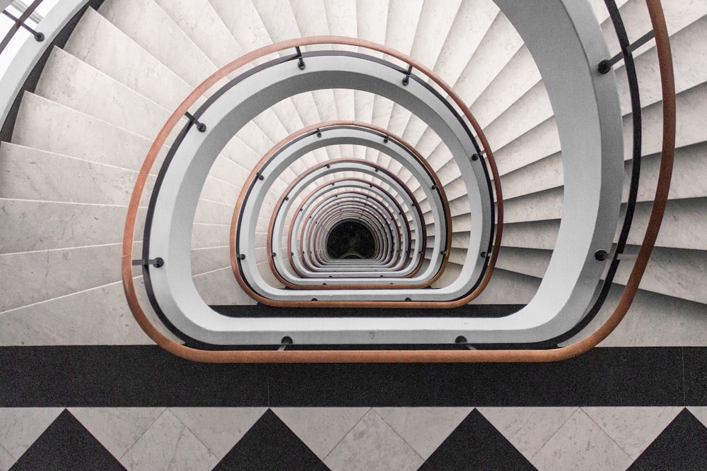 white and brown spiral stairs with no people